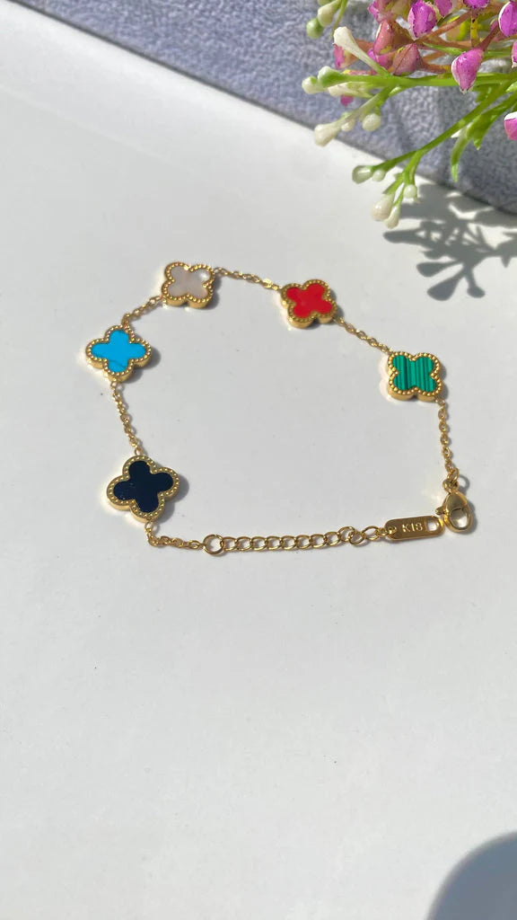 Lucky Clover Enamel Bracelet – Multicolor Floral Charms in Gold Finish